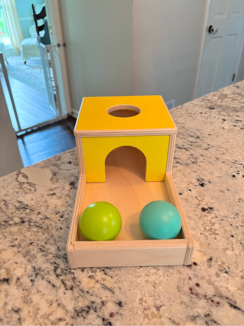 Lovevery Ball Drop Box and wooden ball set from the inspector play kit